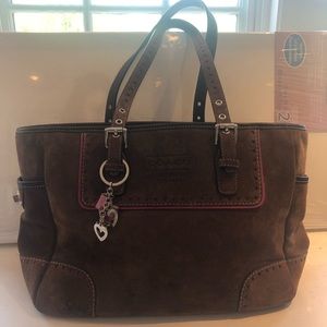 Coach handbag with charm